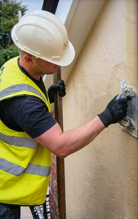 Jack plastering on a construction site